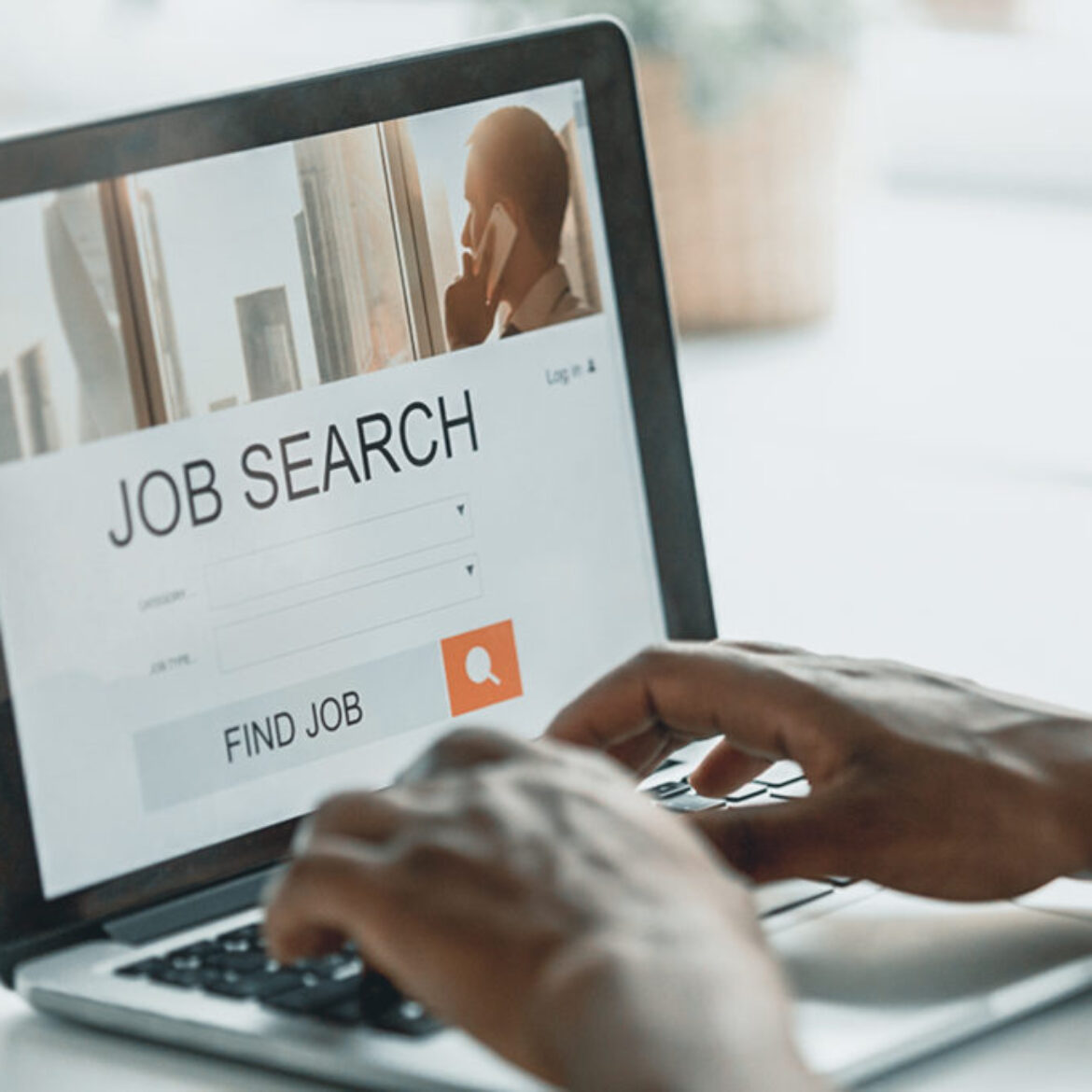 African-american man browsing work online using job search computer app