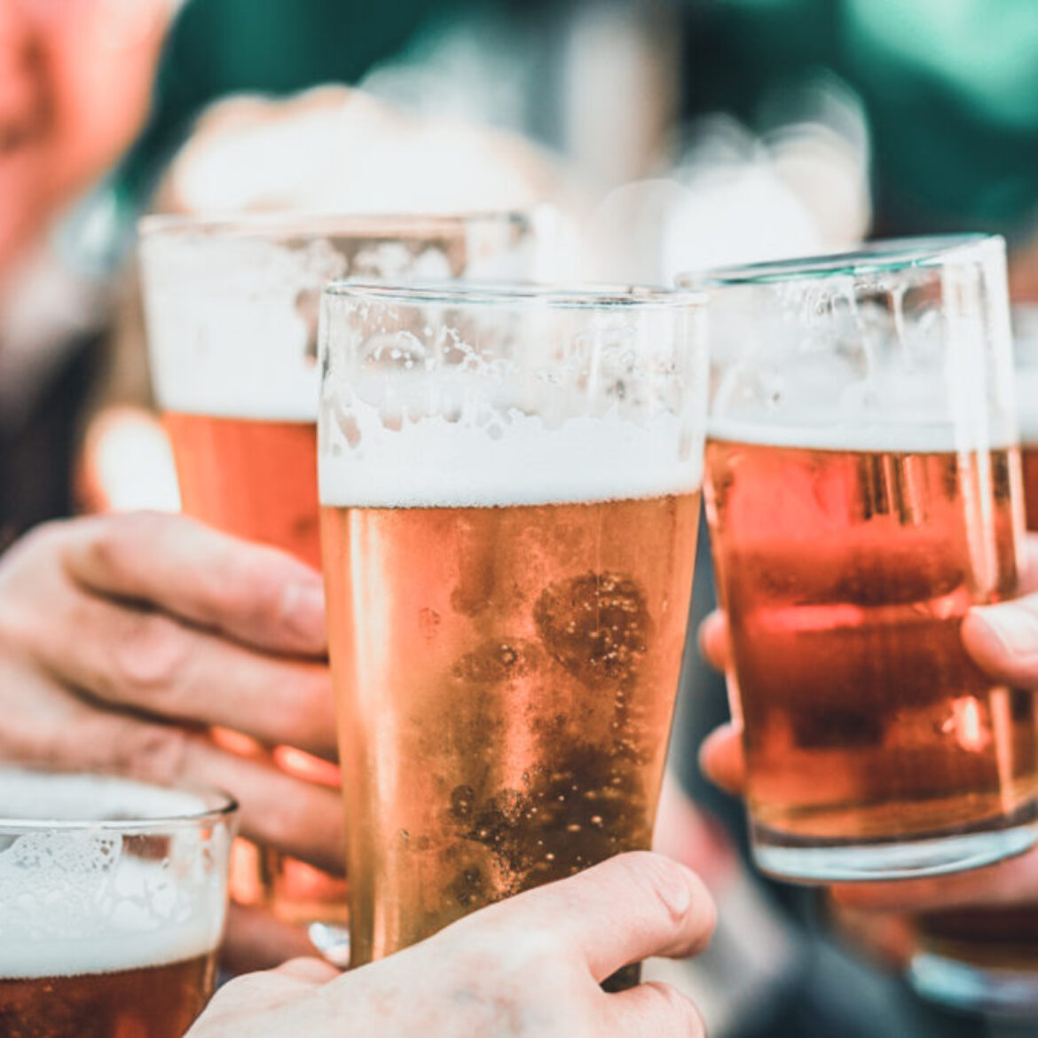 Cheers Celebration Toast with Pints of Beer