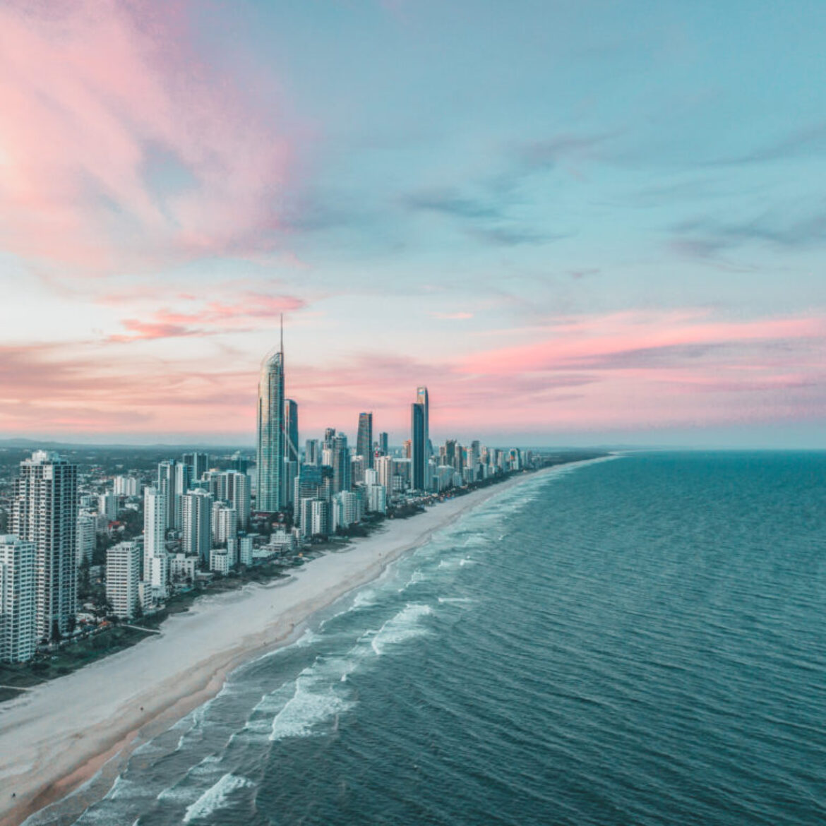 Surfers Paradise skyline aerial view at sunset with a pink sky