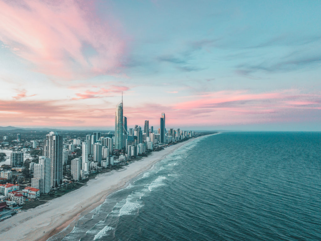 Surfers Paradise skyline aerial view at sunset with a pink sky